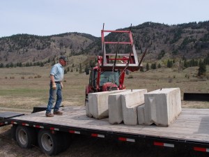 The blocks replace the rotted timbers which shore up the hole.